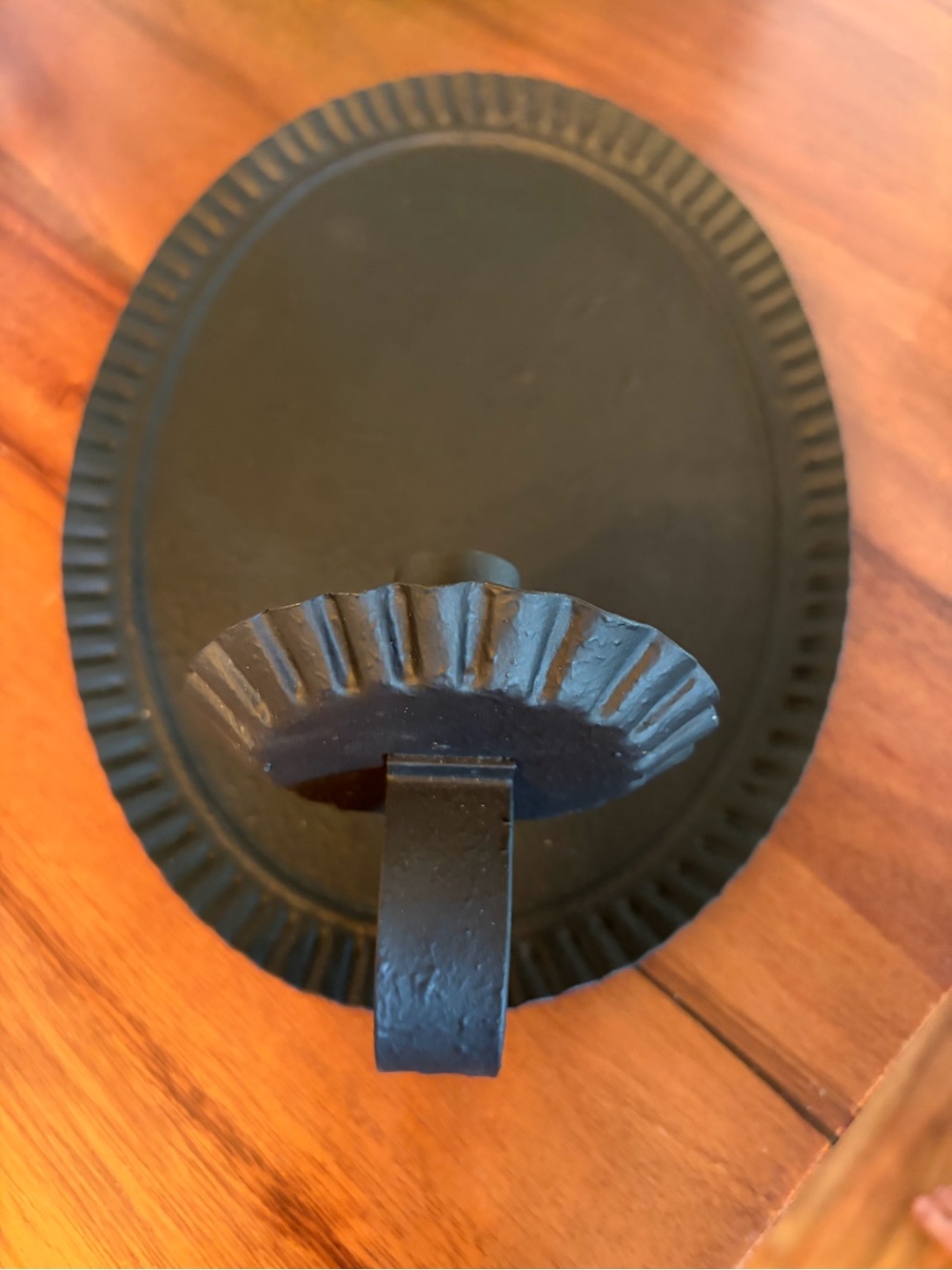 Primitive wall sconce